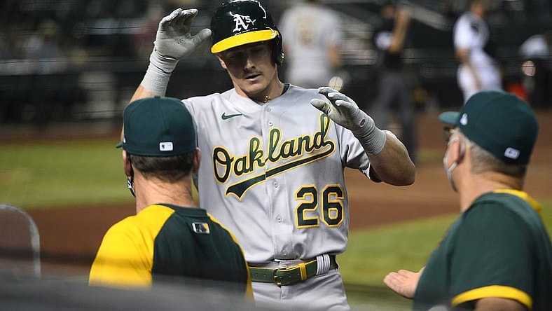 Apr 12, 2021; Phoenix, Arizona, USA; Oakland Athletics third baseman Matt Chapman (26) returns to the dugout after hitting a solo home run against the Arizona Diamondbacks during the fifth inning at Chase Field. Mandatory Credit: Joe Camporeale-USA TODAY Sports