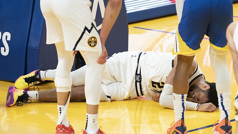 April 12, 2021; San Francisco, California, USA; Denver Nuggets guard Jamal Murray (27) reacts after an injury against the Golden State Warriors during the fourth quarter at Chase Center. Mandatory Credit: Kyle Terada-USA TODAY Sports