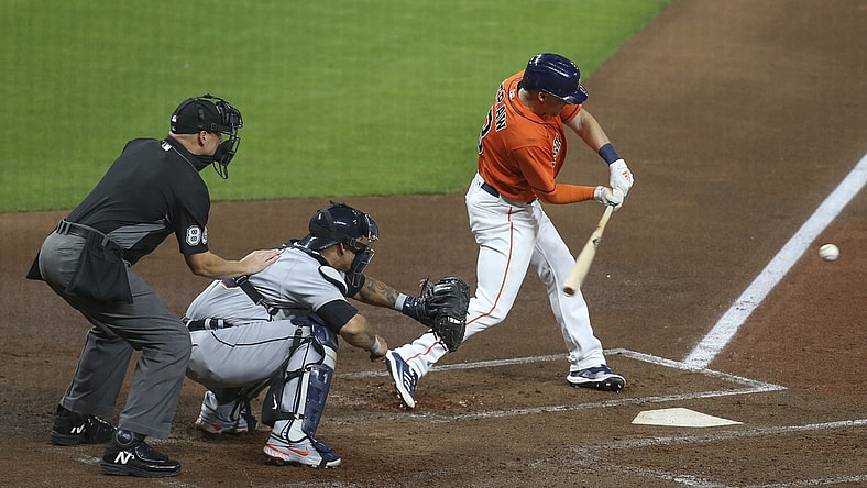 Apr 13, 2021; Houston, Texas, USA; Houston Astros center fielder Myles Straw (3) hits a RBI single against the Detroit Tigers in second inning at Minute Maid Park. Mandatory Credit: Thomas Shea-USA TODAY Sports