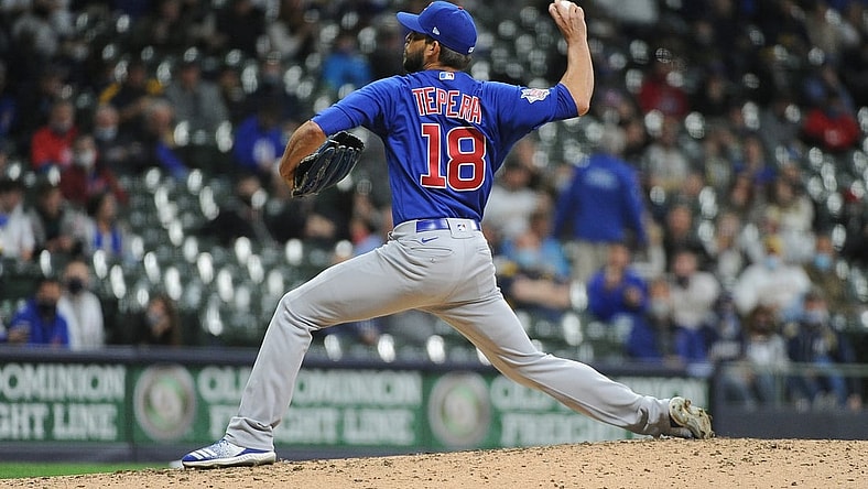 Apr 13, 2021; Milwaukee, Wisconsin, USA; Chicago Cubs relief pitcher Ryan Tepera (18) pitches during the fifth inning against the Milwaukee Brewers at American Family Field. Mandatory Credit: Michael McLoone-USA TODAY Sports