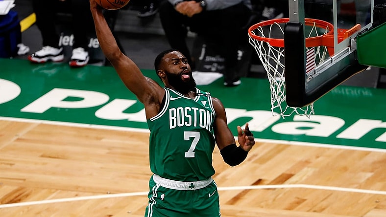 Apr 7, 2021; Boston, Massachusetts, USA; Boston Celtics guard Jaylen Brown (7) goes in for a dunk during the fourth quarter against the New York Knicks at TD Garden. Mandatory Credit: Winslow Townson-USA TODAY Sports