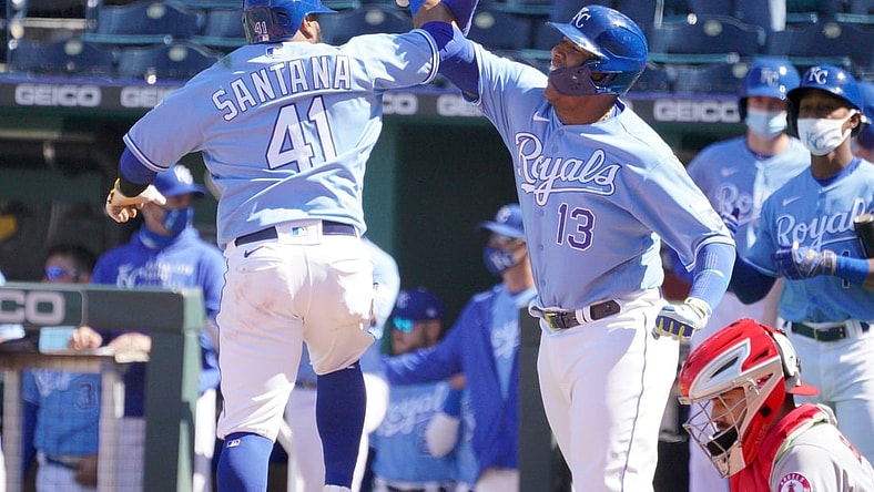Apr 14, 2021; Kansas City, Missouri, USA; Kansas City Royals first baseman Carlos Santana (41) celebrates with catcher Salvador Perez (13) after Santana hit a two run home run in the seventh inning against the Los Angeles Angels at Kauffman Stadium. Mandatory Credit: Denny Medley-USA TODAY Sports