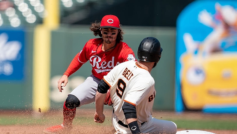 Apr 14, 2021; San Francisco, California, USA; San Francisco Giants first baseman Brandon Belt (9) is caught stealing second base by Cincinnati Reds second baseman Jonathan India (6) during the sixth inning at Oracle Park. Mandatory Credit: Neville E. Guard-USA TODAY Sports
