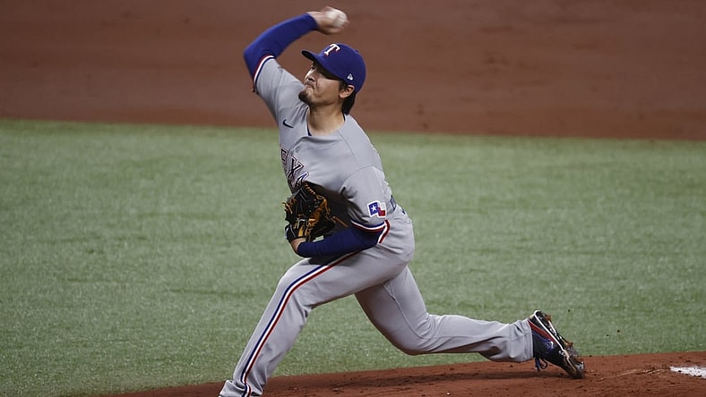 Apr 14, 2021; St. Petersburg, Florida, USA; Texas Rangers starting pitcher Kohei Arihara (35) throws a pitch during the first inning against the Tampa Bay Rays at Tropicana Field. Mandatory Credit: Kim Klement-USA TODAY Sports