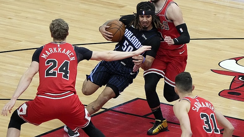 Apr 14, 2021; Chicago, Illinois, USA; Orlando Magic guard Cole Anthony (50) drives to the basket against Chicago Bulls guard Zach LaVine (8) during the second quarter at the United Center. Mandatory Credit: Mike Dinovo-USA TODAY Sports