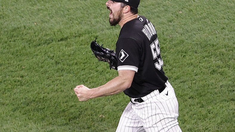 Apr 14, 2021; Chicago, Illinois, USA; Chicago White Sox starting pitcher Carlos Rodon (55) reacts after delivering a final out against the Cleveland Indians during the ninth inning at Guaranteed Rate Field. Mandatory Credit: Kamil Krzaczynski-USA TODAY Sports