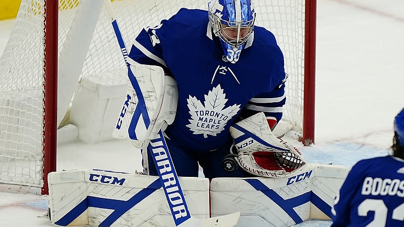Apr 15, 2021; Toronto, Ontario, CAN; Toronto Maple Leafs goaltender David Rittich (33) makes a save against the Winnipeg Jets during the second period at Scotiabank Arena. Mandatory Credit: John E. Sokolowski-USA TODAY Sports