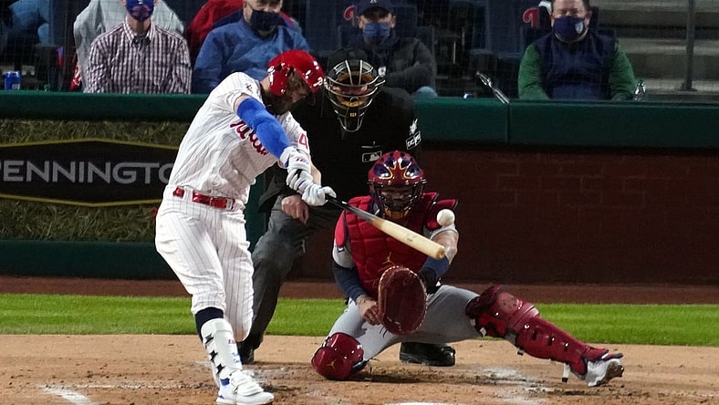 Apr 16, 2021; Philadelphia, Pennsylvania, USA; Philadelphia Phillies right fielder Bryce Harper hits a double driving in two runs in the second inning against the St. Louis Cardinals at Citizens Bank Park. Mandatory Credit: James Lang-USA TODAY Sports