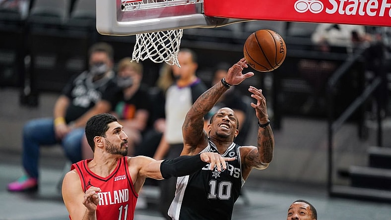 Apr 16, 2021; San Antonio, Texas, USA; San Antonio Spurs forward DeMar DeRozan (10) shoots in the first half against the Portland Trail Blazers at the AT&T Center. Mandatory Credit: Daniel Dunn-USA TODAY Sports
