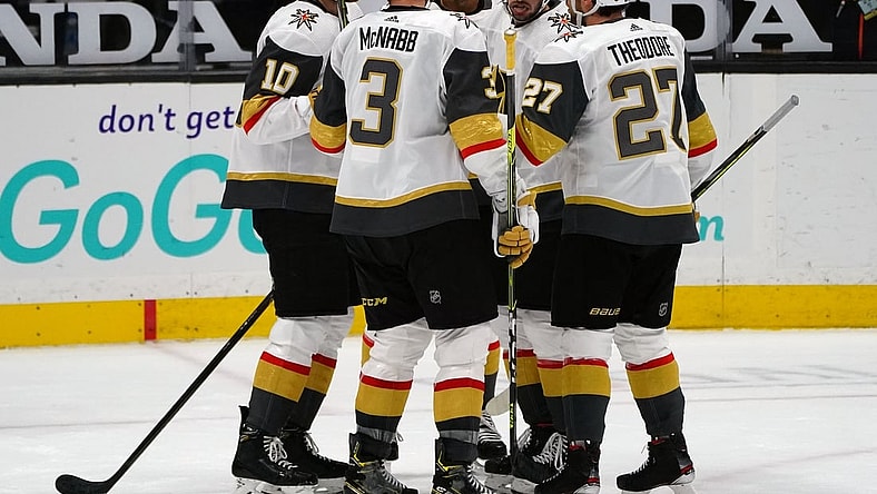 Apr 16, 2021; Anaheim, California, USA; Vegas Golden Knights center Nicolas Roy (10) celebrates with defenseman Brayden McNabb (3) defenseman Shea Theodore (27) left wing Tomas Jurco (13) and left wing Max Pacioretty (67) his goal scored against the Anaheim Ducks during the second period at Honda Center. Mandatory Credit: Gary A. Vasquez-USA TODAY Sports