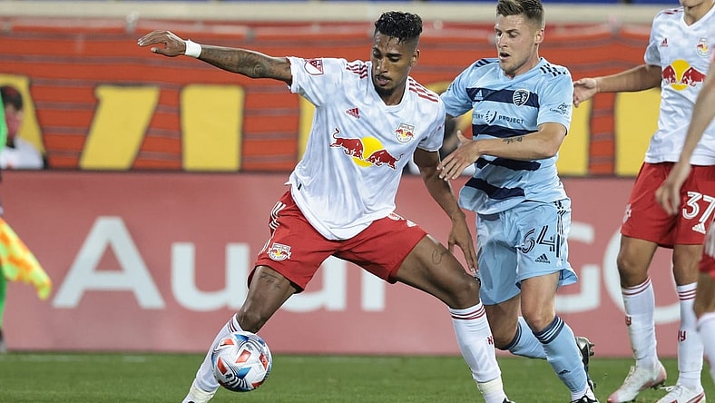 Apr 17, 2021; Harrison, New Jersey, USA; New York Red Bulls forward Fabio (9) plays the ball against Sporting Kansas City midfielder Remi Walker (54) during the first half at Red Bull Arena. Mandatory Credit: Vincent Carchietta-USA TODAY Sports