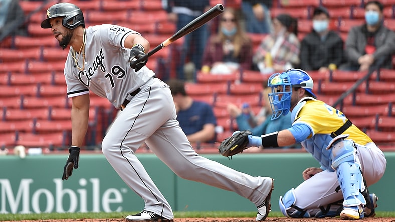 Apr 18, 2021; Boston, Massachusetts, USA; Chicago White Sox first baseman Jose Abreu (79) hits an infield single during the fourth inning of game 1 agains the Boston Red Sox at Fenway Park. Mandatory Credit: Bob DeChiara-USA TODAY Sports