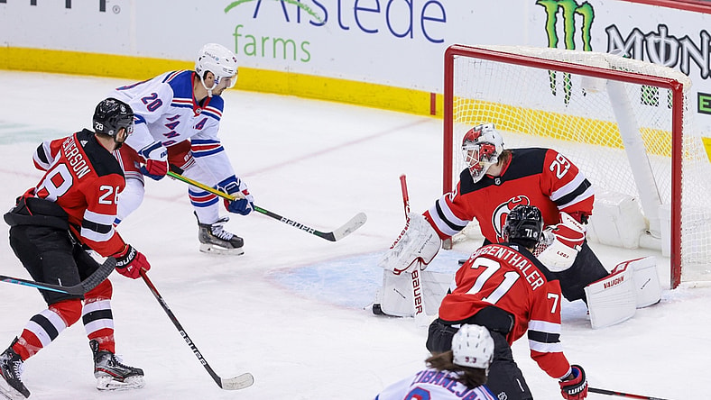 Apr 18, 2021; Newark, New Jersey, USA; New York Rangers left wing Chris Kreider (20) scores a goal past New Jersey Devils goaltender Mackenzie Blackwood (29) during the first period at Prudential Center. Mandatory Credit: Vincent Carchietta-USA TODAY Sports