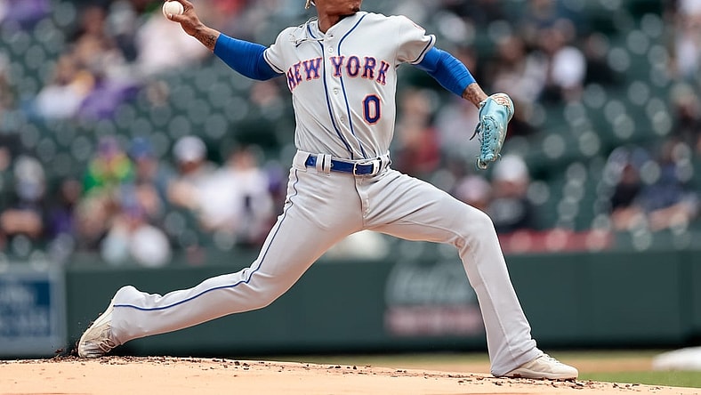 Apr 18, 2021; Denver, Colorado, USA; New York Mets starting pitcher Marcus Stroman (0) pitches in the first inning against the Colorado Rockies at Coors Field. Mandatory Credit: Isaiah J. Downing-USA TODAY Sports