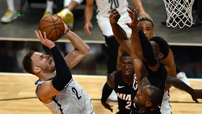 Apr 18, 2021; Miami, Florida, USA; Brooklyn Nets forward Blake Griffin (2) takes shot over Miami Heat forward Andre Iguodala (28) during the first half at American Airlines Arena. Mandatory Credit: Jim Rassol-USA TODAY Sports