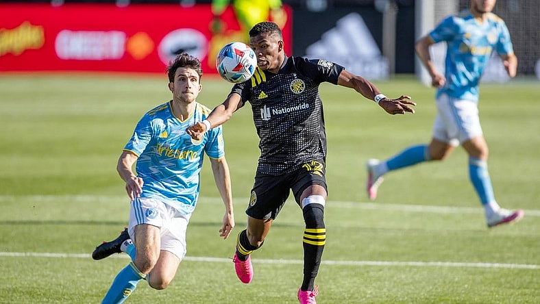 Apr 18, 2021; Columbus, Ohio, USA; Columbus Crew SC midfielder Luis Diaz (12) heads the ball in the first half against the Philadelphia Union  at Historic Crew Stadium. Mandatory Credit: Trevor Ruszkowski-USA TODAY Sports
