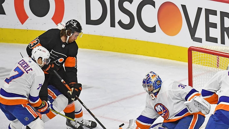 Apr 18, 2021; Philadelphia, Pennsylvania, USA; New York Islanders goaltender Ilya Sorokin (30) makes a save against Philadelphia Flyers center Kevin Hayes (13) during the second period at Wells Fargo Center. Mandatory Credit: Eric Hartline-USA TODAY Sports