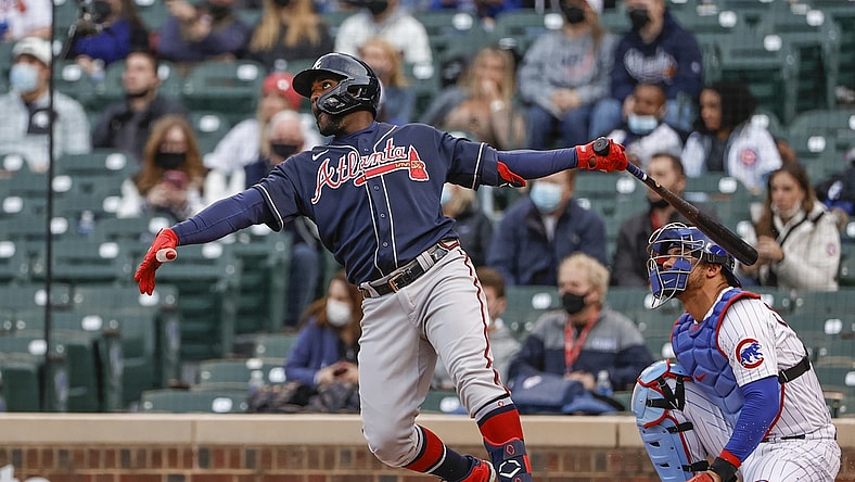 Apr 18, 2021; Chicago, Illinois, USA; Atlanta Braves center fielder Guillermo Heredia (38) hits a two-run home run against the Chicago Cubs during the first inning at Wrigley Field. Mandatory Credit: Kamil Krzaczynski-USA TODAY Sports