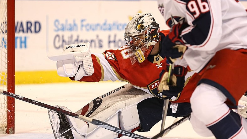 Apr 20, 2021; Sunrise, Florida, USA; Florida Panthers goaltender Spencer Knight (30) attempts to make a save against the Columbus Blue Jackets during the first period at BB&T Center. Mandatory Credit: Sam Navarro-USA TODAY Sports