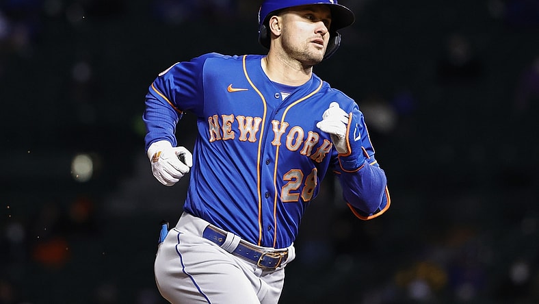 Apr 20, 2021; Chicago, Illinois, USA; New York Mets left fielder J.D. Davis (28) rounds the bases after hitting a solo home run against the Chicago Cubs during the fifth inning at Wrigley Field. Mandatory Credit: Kamil Krzaczynski-USA TODAY Sports
