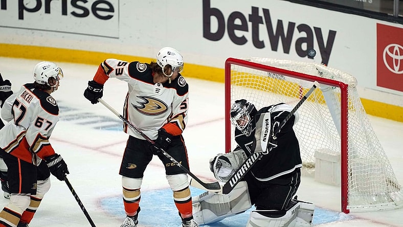 Apr 20, 2021; Los Angeles, California, USA; LA Kings goaltender Calvin Petersen (40) defends the goal against Anaheim Ducks left wing Max Comtois (53) in the first period at Staples Center. Mandatory Credit: Kirby Lee-USA TODAY Sports