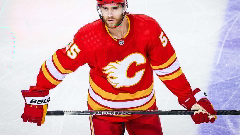 Apr 10, 2021; Calgary, Alberta, CAN; Calgary Flames defenseman Noah Hanifin (55) against the Edmonton Oilers during the first period at Scotiabank Saddledome. Mandatory Credit: Sergei Belski-USA TODAY Sports