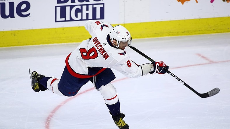 Apr 17, 2021; Philadelphia, Pennsylvania, USA; Washington Capitals left wing Alex Ovechkin (8) takes a shot in the first period against the Philadelphia Flyers at Wells Fargo Center. Mandatory Credit: Kyle Ross-USA TODAY Sports
