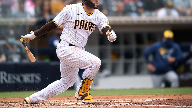 Apr 21, 2021; San Diego, California, USA; San Diego Padres catcher Victor Caratini (17) scores right fielder Jurickson Profar (not pictured) on a ground out during the fourth inning against the Milwaukee Brewers at Petco Park. Mandatory Credit: Orlando Ramirez-USA TODAY Sports