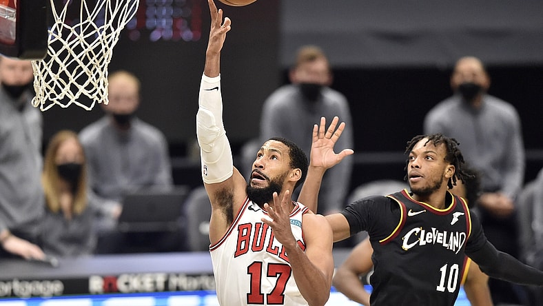 Apr 21, 2021; Cleveland, Ohio, USA; Chicago Bulls forward Garrett Temple (17) drives against Cleveland Cavaliers guard Darius Garland (10) in the second quarter at Rocket Mortgage FieldHouse. Mandatory Credit: David Richard-USA TODAY Sports