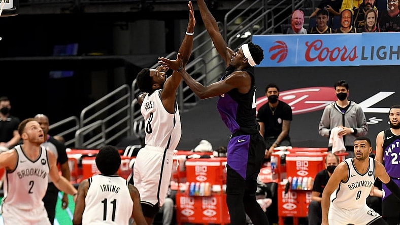 Apr 21, 2021; Tampa, Florida, USA; Toronto Raptors forward Pascal Siakam (43) takes a shot over Brooklyn Nets forward Jeff Green (8) in the first quarter at Amalie Arena. Mandatory Credit: Jonathan Dyer-USA TODAY Sports