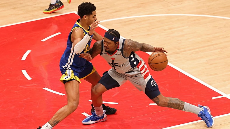 Apr 21, 2021; Washington, District of Columbia, USA; Washington Wizards guard Bradley Beal (3) drives to the basket as Golden State Warriors guard Jordan Poole (3) defends in the second quarter at Capital One Arena. Mandatory Credit: Geoff Burke-USA TODAY Sports