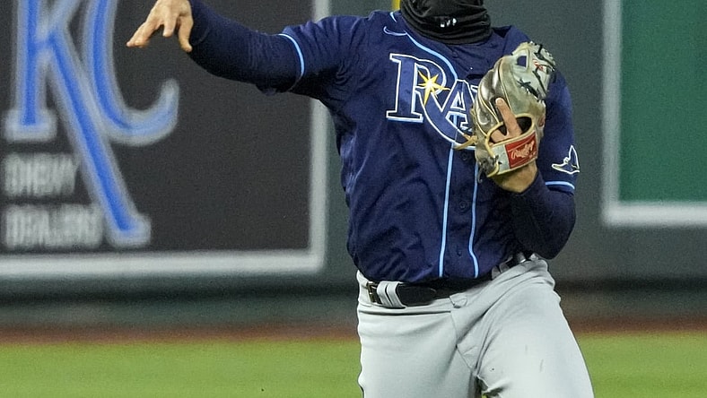 Apr 21, 2021; Kansas City, Missouri, USA; Tampa Bay Rays shortstop Willy Adames (1) throws to first base against the Kansas City Royals during the fourth inning at Kauffman Stadium. Mandatory Credit: Jay Biggerstaff-USA TODAY Sports