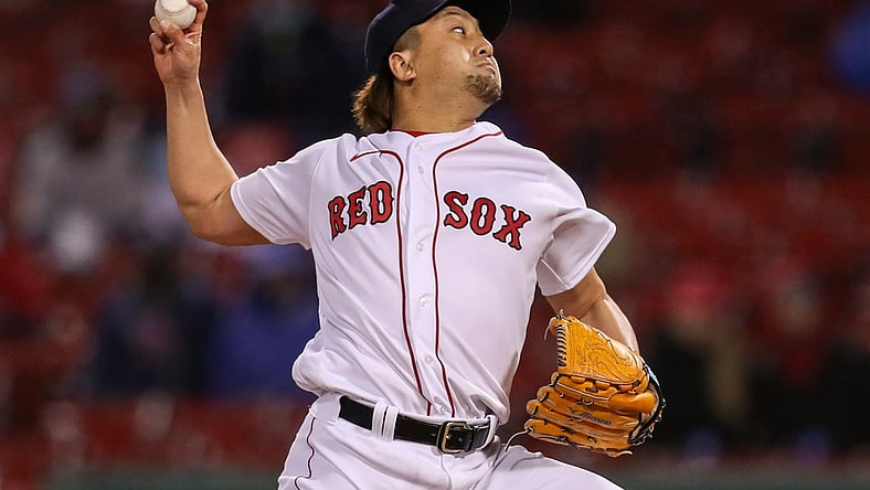 Apr 21, 2021; Boston, Massachusetts, USA; Boston Red Sox relief pitcher Hirokazu Sawamura (19) delivers a pitch against the Toronto Blue Jays during the fifth inning at Fenway Park. Mandatory Credit: Paul Rutherford-USA TODAY Sports