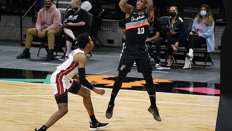 Apr 21, 2021; San Antonio, Texas, USA; San Antonio Spurs forward DeMar DeRozan (10) shoots the ball against over Miami Heat forward KZ Okpala (11) in the second quarter at AT&T Center. Mandatory Credit: Scott Wachter-USA TODAY Sports