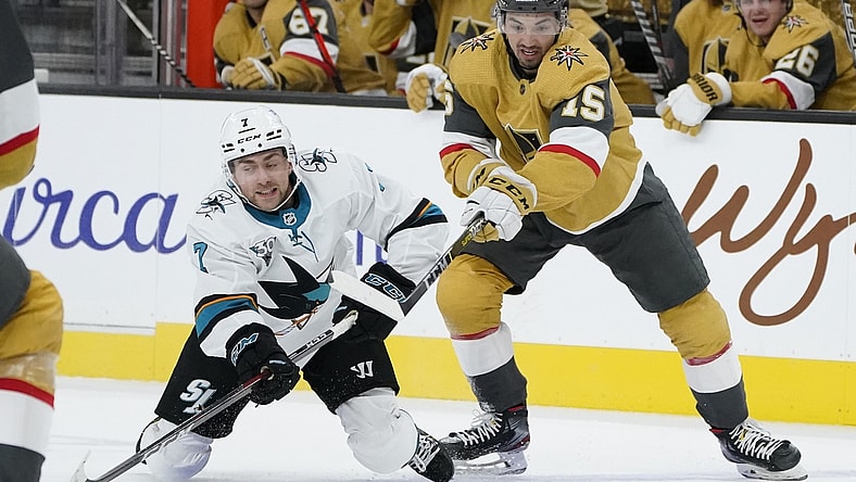 Apr 21, 2021; Las Vegas, Nevada, USA; San Jose Sharks center Dylan Gambrell (7) and Vegas Golden Knights  Dylan Sikura vie for the puck during the first period of an NHL hockey game at T-Mobile Arena. Mandatory Credit:  POOL PHOTOS-USA TODAY Sports