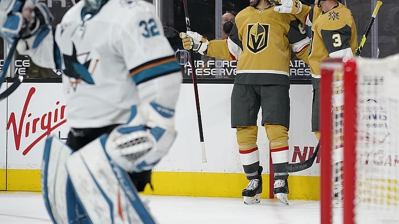 Apr 21, 2021; Las Vegas, Nevada, USA; Vegas Golden Knights right wing Alex Tuch, second from right, celebrates after scoring against San Jose Sharks goaltender Josef Korenar (32) during the second period of an NHL hockey game at T-Mobile Arena. Mandatory Credit:  POOL PHOTOS-USA TODAY Sports