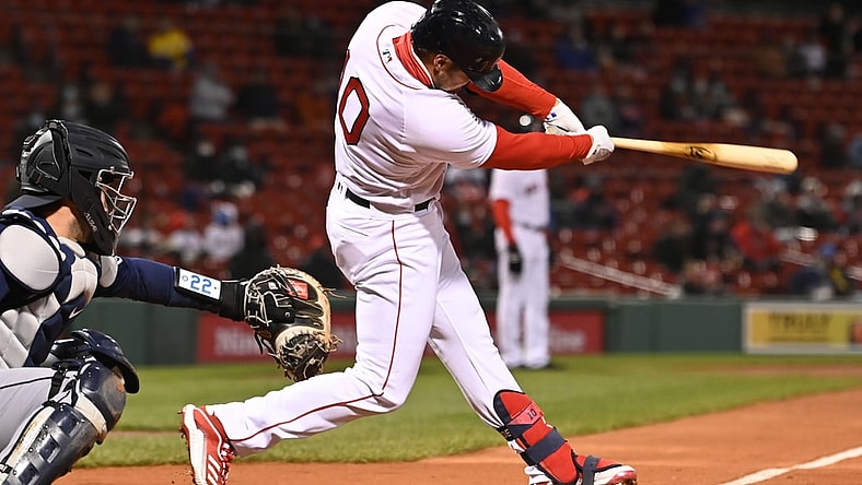 Apr 22, 2021; Boston, Massachusetts, USA; Boston Red Sox right fielder Hunter Renfroe (10) hits a RBI single against the Seattle Mariners during the fourth inning at Fenway Park. Mandatory Credit: Brian Fluharty-USA TODAY Sports