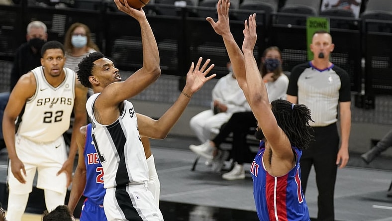 Apr 22, 2021; San Antonio, Texas, USA; San Antonio Spurs forward Keita Bates-Diop (31) shoots over Detroit Pistons center Jahlil Okafor (13) in the first quarter at AT&T Center. Mandatory Credit: Scott Wachter-USA TODAY Sports