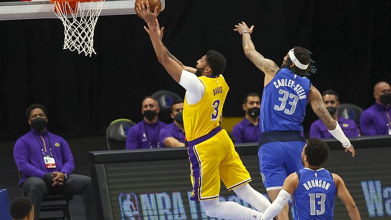 Apr 22, 2021; Dallas, Texas, USA;  Los Angeles Lakers forward Anthony Davis (3) shoots past Dallas Mavericks center Willie Cauley-Stein (33) during the first quarter at American Airlines Center. Mandatory Credit: Kevin Jairaj-USA TODAY Sports