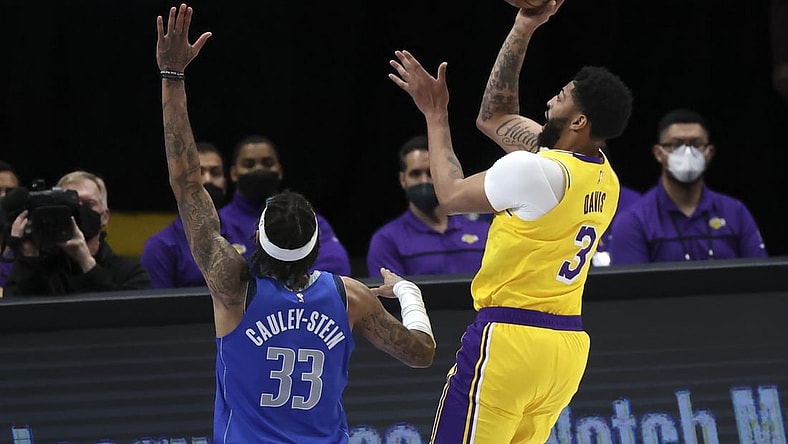 Apr 22, 2021; Dallas, Texas, USA;  Los Angeles Lakers forward Anthony Davis (3) shoots over Dallas Mavericks center Willie Cauley-Stein (33) during the first quarter at American Airlines Center. Mandatory Credit: Kevin Jairaj-USA TODAY Sports