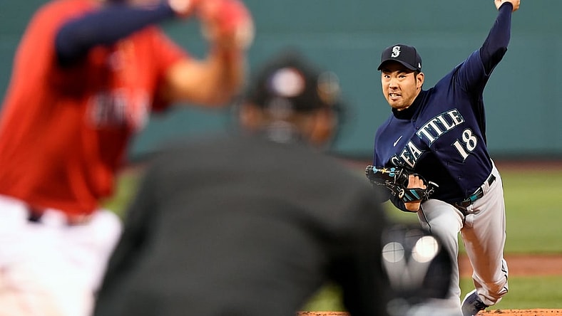 Apr 23, 2021; Boston, Massachusetts, USA; Seattle Mariners starting pitcher Yusei Kikuchi (18) pitches against the Boston Red Sox during the first inning at Fenway Park. Mandatory Credit: Brian Fluharty-USA TODAY Sports
