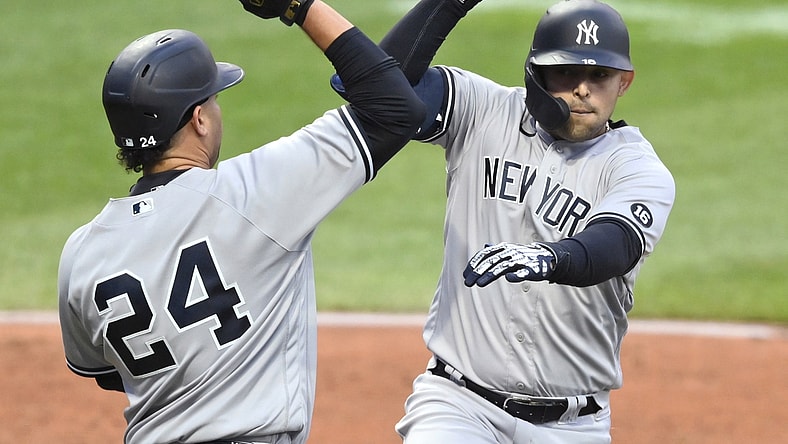 Apr 23, 2021; Cleveland, Ohio, USA; New York Yankees second baseman Rougned Odor (R) celebrates his two-run home run with catcher Gary Sanchez (24) during the second inning against the Cleveland Indians at Progressive Field. Mandatory Credit: David Richard-USA TODAY Sports