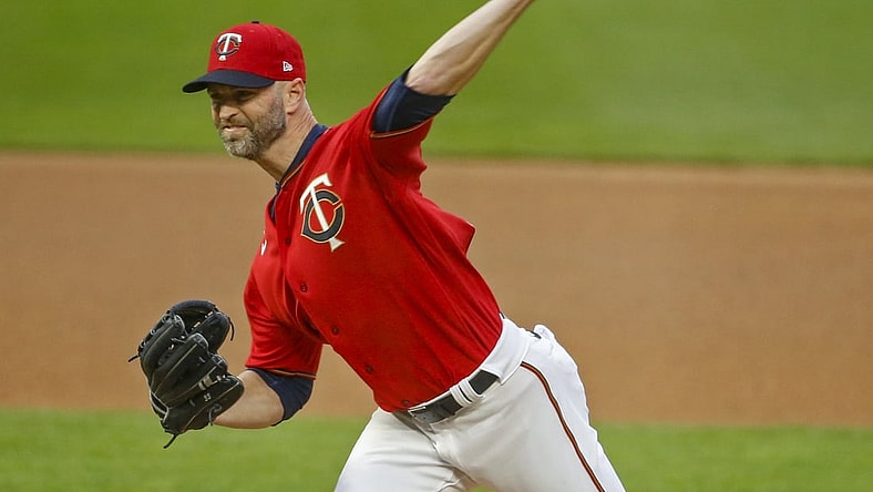 Apr 23, 2021; Minneapolis, Minnesota, USA; Minnesota Twins starting pitcher J.A. Happ (33) pitches to the Pittsburgh Pirates in the first inning at Target Field. Mandatory Credit: Bruce Kluckhohn-USA TODAY Sports