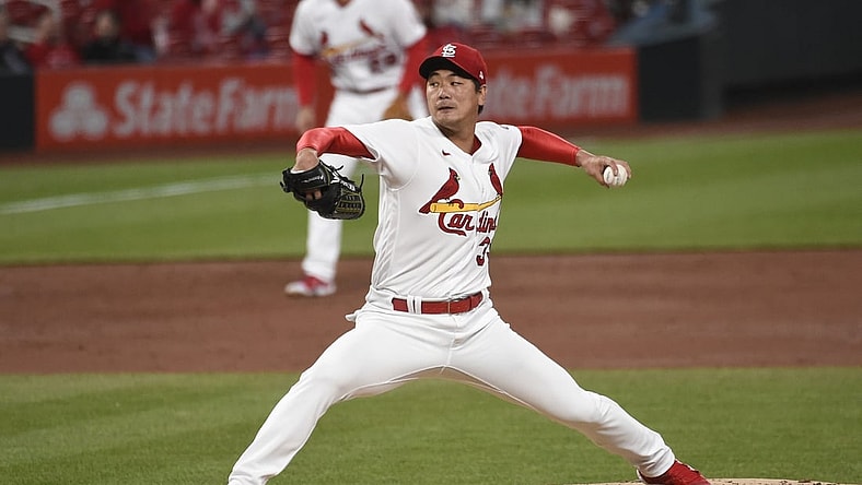 Apr 23, 2021; St. Louis, Missouri, USA; St. Louis Cardinals starting pitcher Kwang Hyun Kim (33) pitches against the Cincinnati Reds in the third inning at Busch Stadium. Mandatory Credit: Joe Puetz-USA TODAY Sports