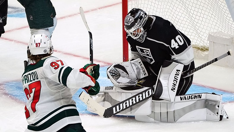 Apr 23, 2021; Los Angeles, California, USA; Minnesota Wild left wing Kirill Kaprizov (97) shoots on goal against Los Angeles Kings goaltender Calvin Petersen (40) during the third period at Staples Center. Mandatory Credit: Gary A. Vasquez-USA TODAY Sports