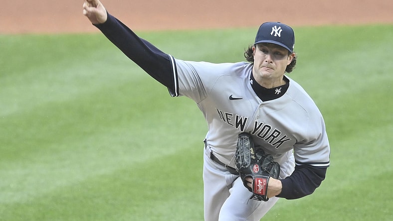 Apr 24, 2021; Cleveland, Ohio, USA; New York Yankees starting pitcher Gerrit Cole (45) delivers in the first inning against the Cleveland Indians at Progressive Field. Mandatory Credit: David Richard-USA TODAY Sports