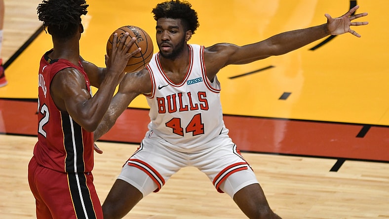 Apr 24, 2021; Miami, Florida, USA; Chicago Bulls forward Patrick Williams (44) pressures Miami Heat forward Jimmy Butler (22) during the first half at American Airlines Arena. Mandatory Credit: Jim Rassol-USA TODAY Sports