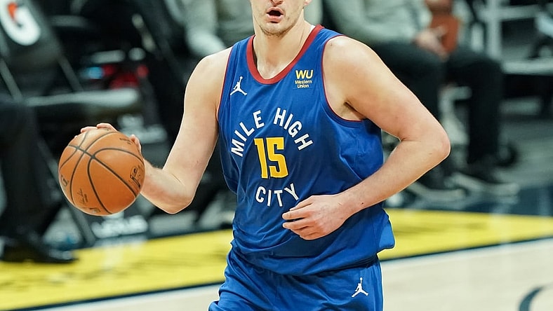 Apr 24, 2021; Denver, Colorado, USA; Denver Nuggets center Nikola Jokic (15) against the Houston Rockets during the second quarter at Ball Arena. Mandatory Credit: Troy Babbitt-USA TODAY Sports