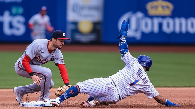 Apr 25, 2021; New York City, New York, USA; Washington Nationals shortstop Trea Turner (7) tags New York Mets second baseman Jonathan Villar (1) for an out after being picked off at first base during the second inning inning at Citi Field. Mandatory Credit: Vincent Carchietta-USA TODAY Sports