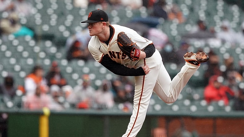 Apr 25, 2021; San Francisco, California, USA; San Francisco Giants starting pitcher Logan Webb (62) throws a pitch during the first inning against the Miami Marlins at Oracle Park. Mandatory Credit: Darren Yamashita-USA TODAY Sports
